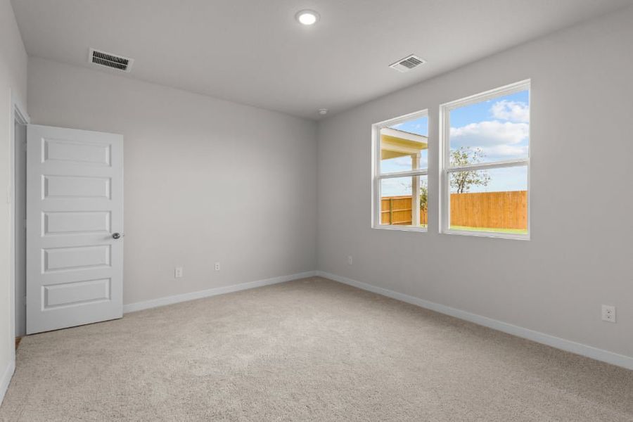 A room with a window and a door.