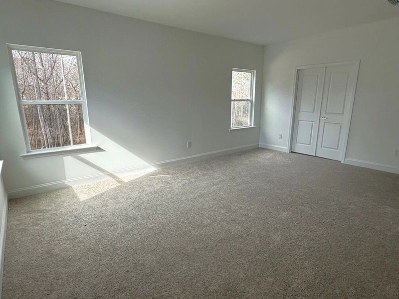 Primary Bed featuring the AW Collection® Coastal - A serene space with soft textures and light. Primary Bed featuring the AW Collection® Coastal - A serene space with soft textures and light.