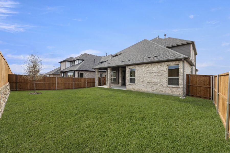 Exterior details and patio area of a home in Brookshire at Legacy Hills, Celina (Image 19). Exterior details and patio area of a home in Brookshire at Legacy Hills, Celina (Image 19).