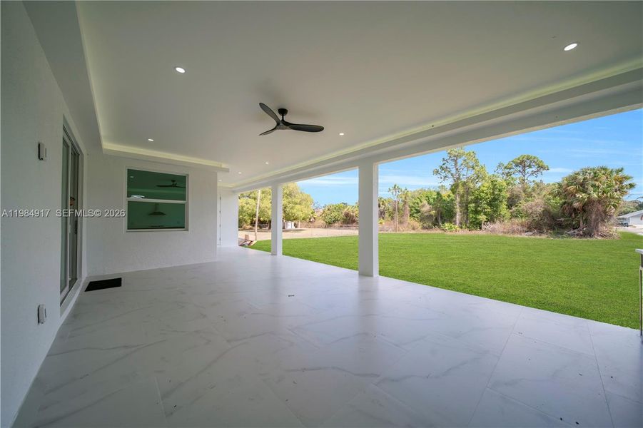 Exterior details and patio area of a home in , Lehigh Acres (Image 4). Exterior details and patio area of a home in , Lehigh Acres (Image 4).