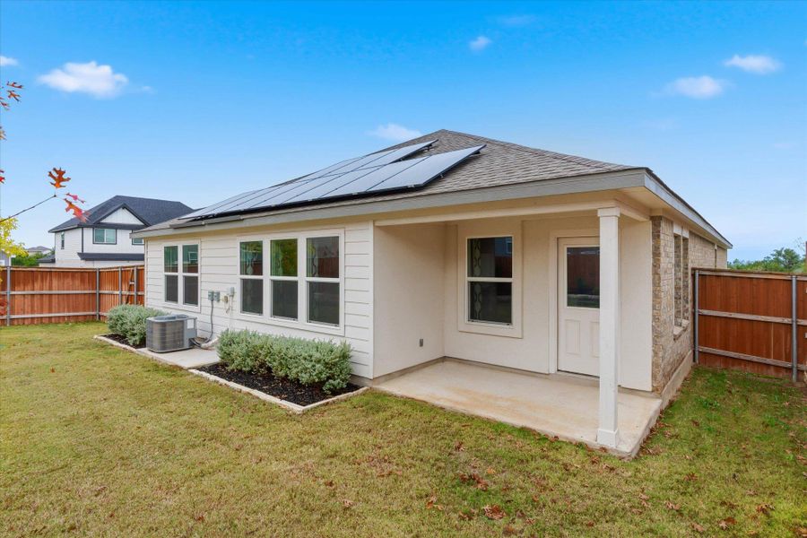 Exterior details and patio area of a home in Thunder Rock: Watermill Collection, Marble Falls (Image 25).
