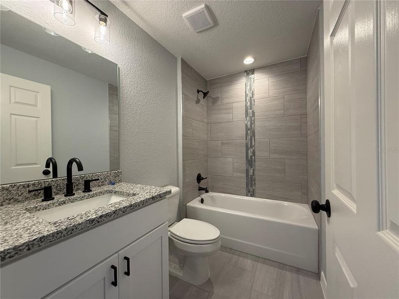 Furnished interior view inside a new home in , Dunnellon (Image 7).