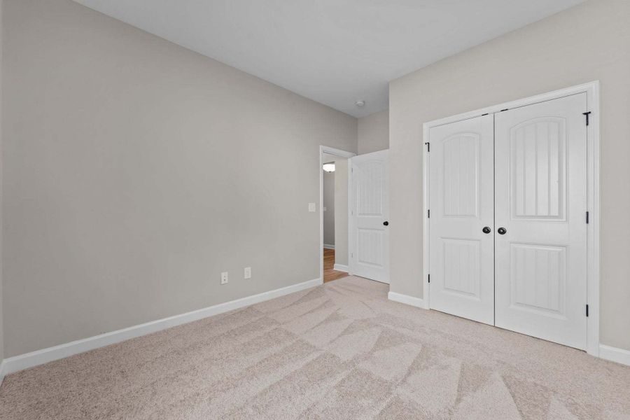 Representative unfurnished interior of a home built from the Weymouth by Caviness & Cates Communities in Bartlett Manor, Youngsville (Image 105).
