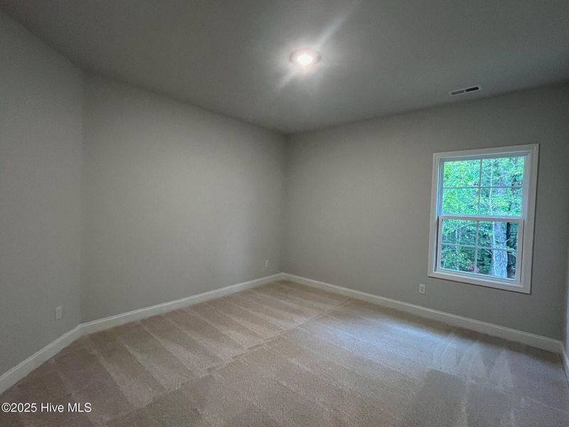 Spacious, unfurnished interior of a new home in Palmetto Creek, Bolivia (Image 26).