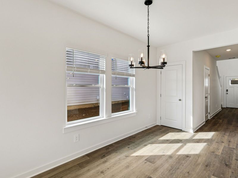 The open-concept floorplan allows for an easy flow between the kitchen and dining areas.