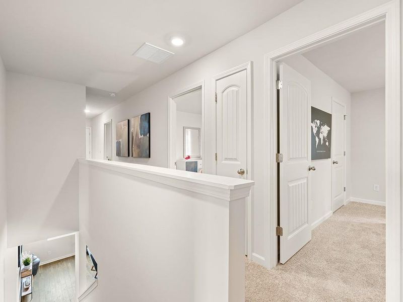 Furnished interior view inside a new home in Oaks at Cedar Grove, Fairburn (Image 4).