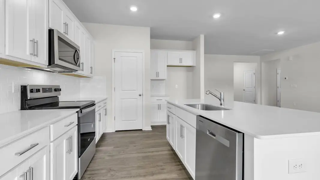 Furnished interior view inside a new home in Villa Grande, Winterville (Image 7).