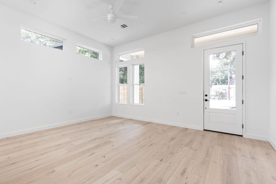Entryway featuring ceiling fan and light wood finished floors Entryway featuring ceiling fan and light wood finished floors