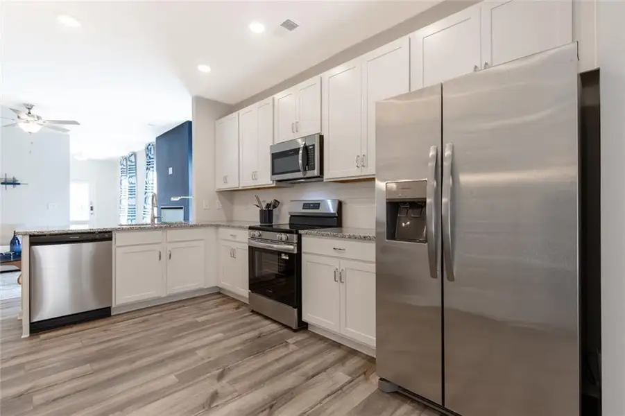 Furnished interior view inside a new home in The Andros, Dalton (Image 4).