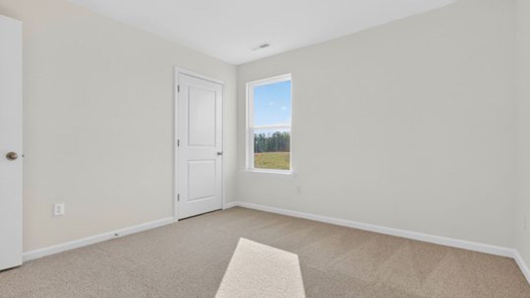 Spacious, unfurnished interior of a new home in The Reserve at Prestleigh, Wake Forest (Image 28).