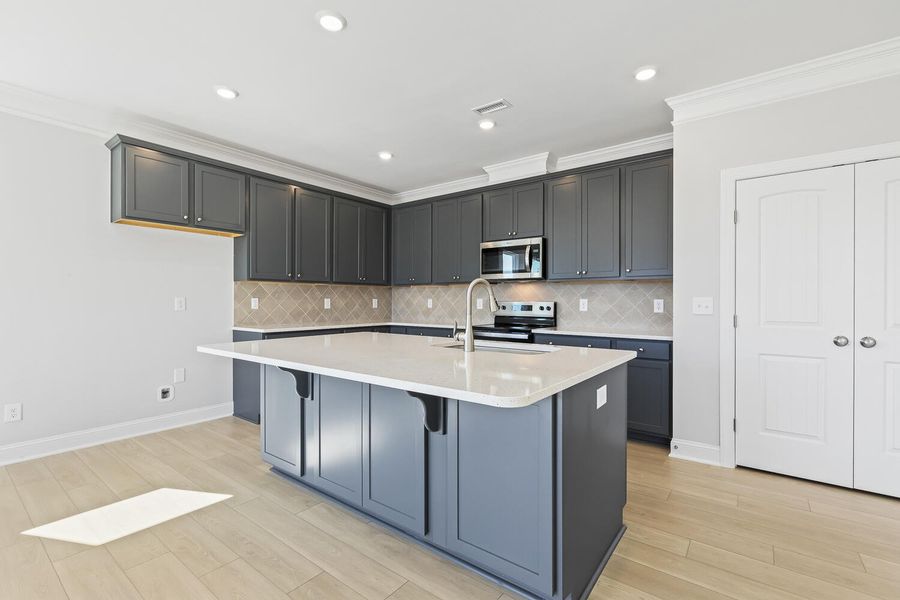 Furnished interior view inside a new home in 1158 Place, Wilson (Image 6).