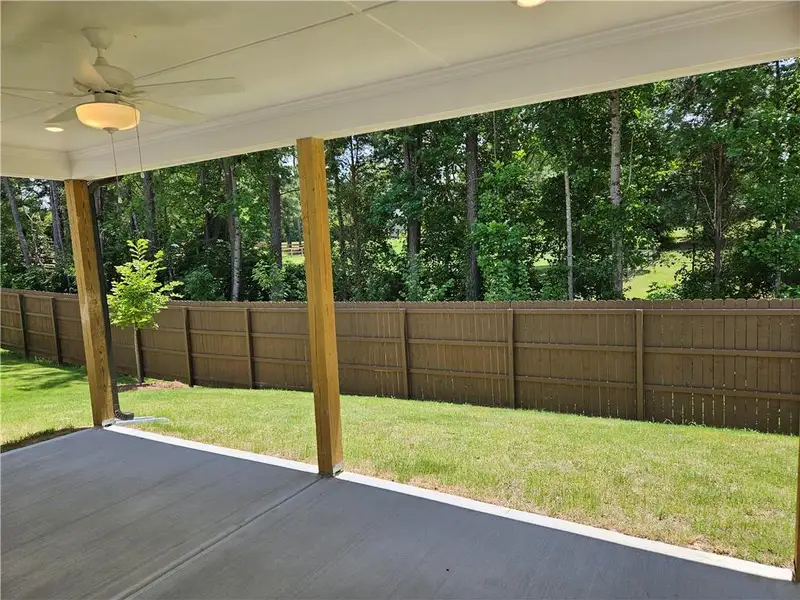 Exterior details and patio area of a home in Park at Ansleigh Farms, Dallas (Image 3).