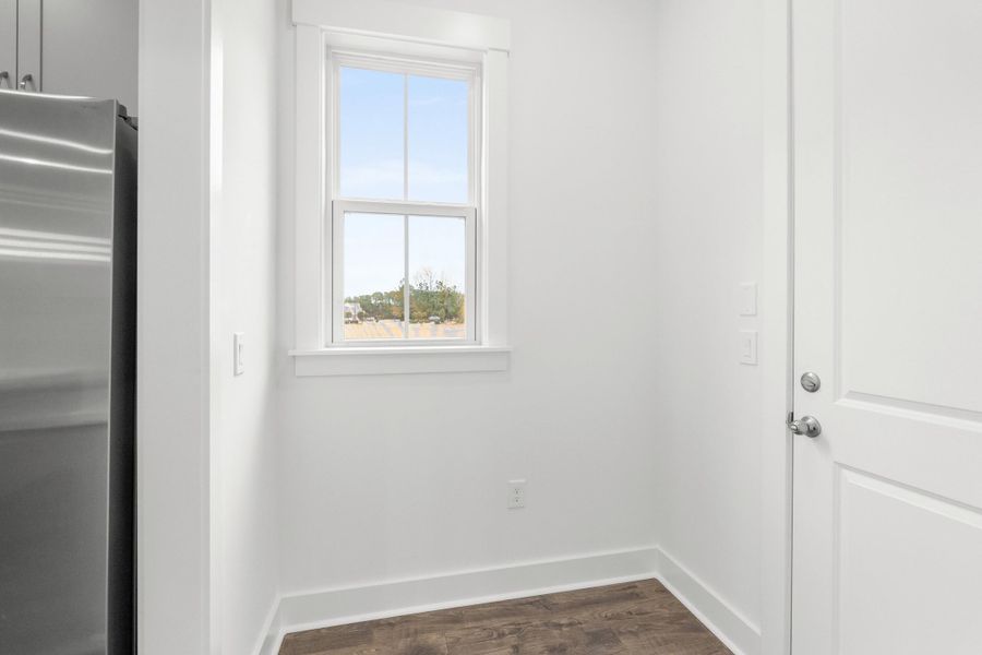 Spacious, unfurnished interior of a new home in Long Bay Golf Club, Longs (Image 30).