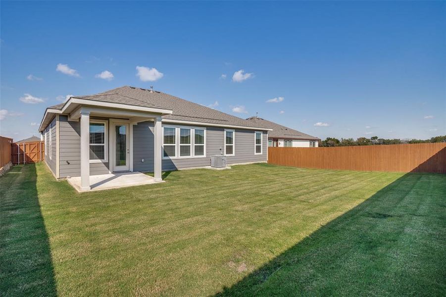 Exterior details and patio area of a home in Heartland Signature, Crandall (Image 2). Exterior details and patio area of a home in Heartland Signature, Crandall (Image 2).