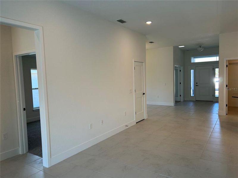 Spacious, unfurnished interior of a new home in Watercress Cove, North Port (Image 10).
