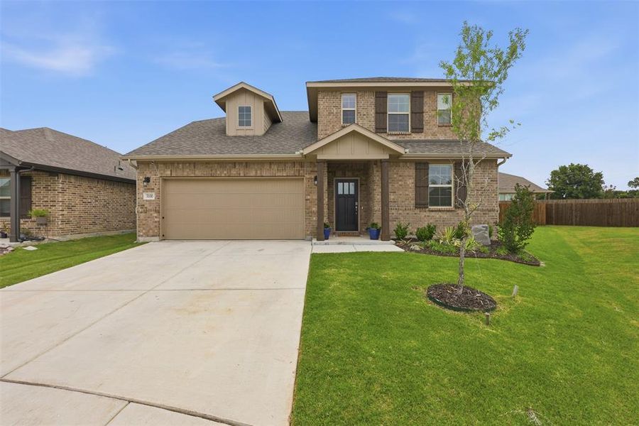Front exterior of a new home in , Denton, TX, highlighting curb appeal (Image 20).