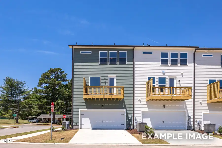 Front exterior of a new home in Camden Park, Knightdale, NC, highlighting curb appeal (Image 2). Front exterior of a new home in Camden Park, Knightdale, NC, highlighting curb appeal (Image 2).