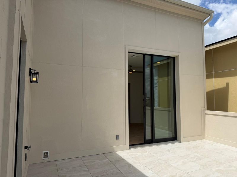 Exterior details and patio area of a home in , Houston (Image 3).