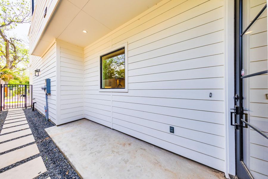 Exterior details and patio area of a home in , Houston (Image 4).