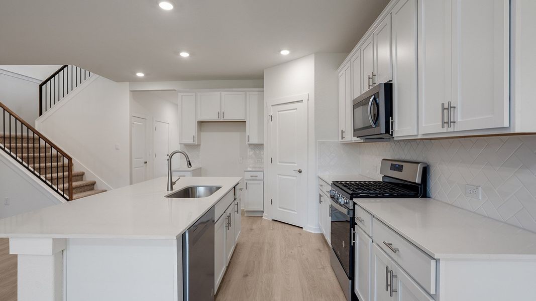 Furnished interior view inside a new home in Prairie Oaks, Oak Point (Image 7).