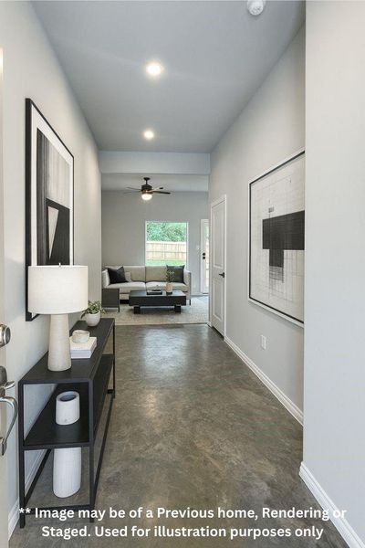 Take a walk through the grand foyer entry way leading to the family room Take a walk through the grand foyer entry way leading to the family room
