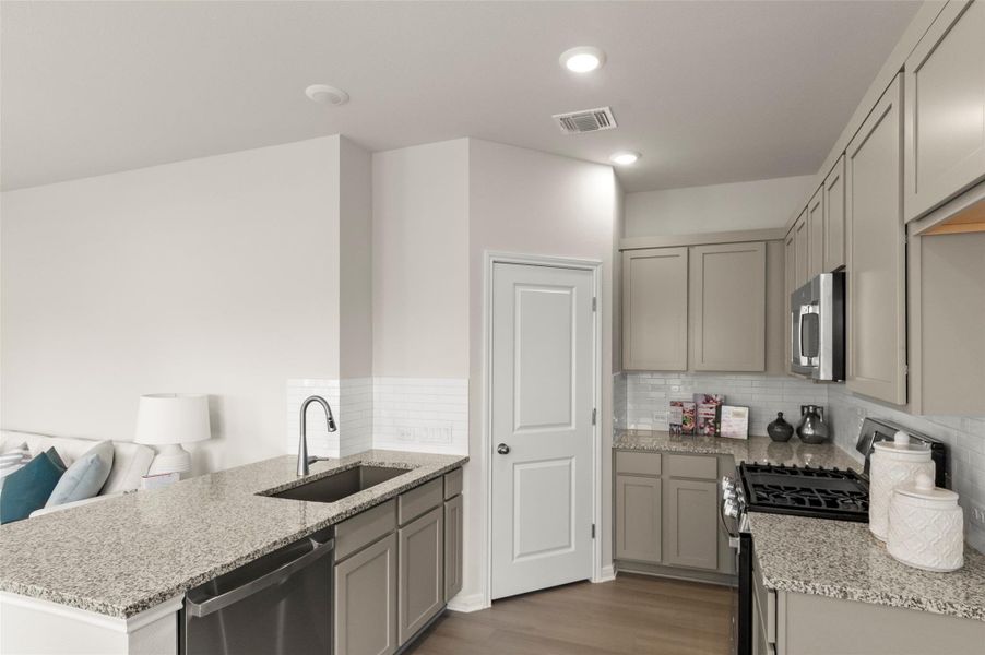 Furnished interior view inside a new home in Blanco Vista, San Marcos (Image 9).