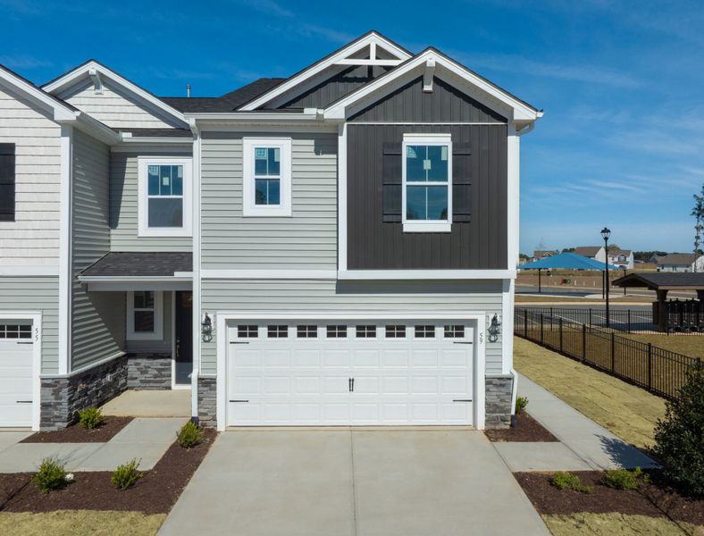 Front exterior of a new home in Powell, Angier, NC, highlighting curb appeal (Image 17).