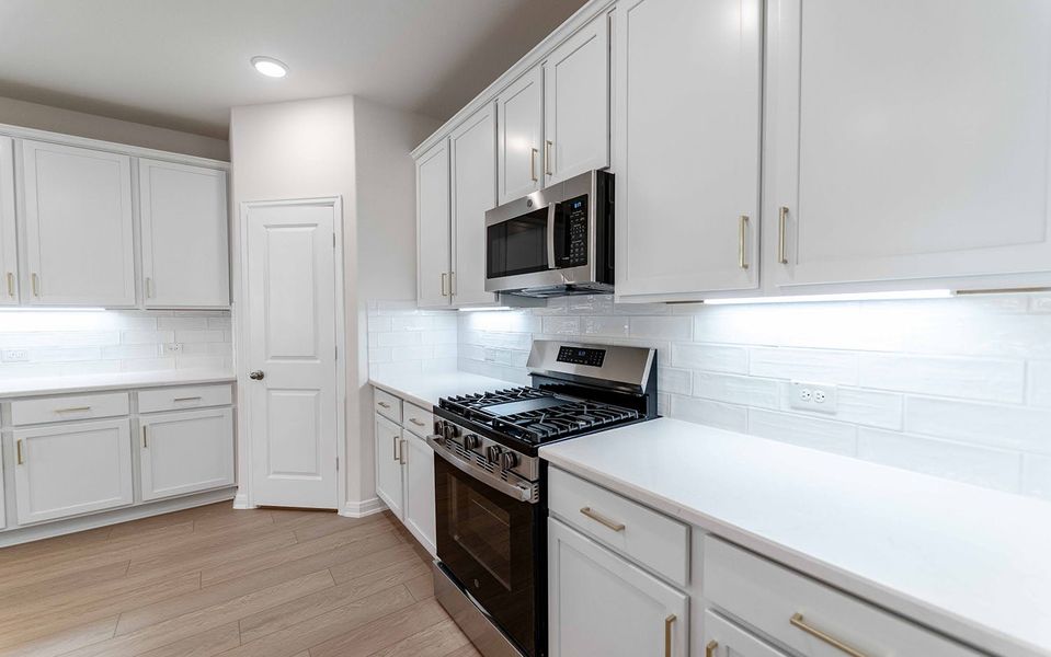 Furnished interior view inside a new home in La Terra, Celina (Image 5).