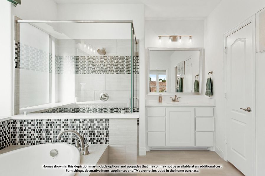 Bathroom with soaking tub, glass-enclosed shower, mosaic tile accents, and white vanity with mirror Bathroom with soaking tub, glass-enclosed shower, mosaic tile accents, and white vanity with mirror