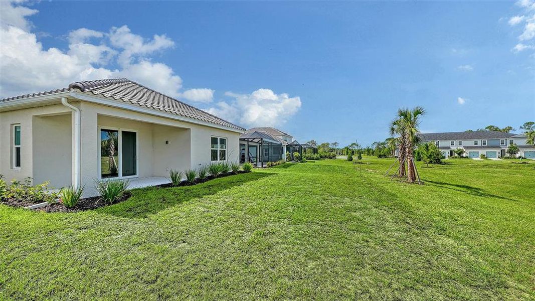 Exterior details and patio area of a home in Grand Park, Sarasota (Image 21).