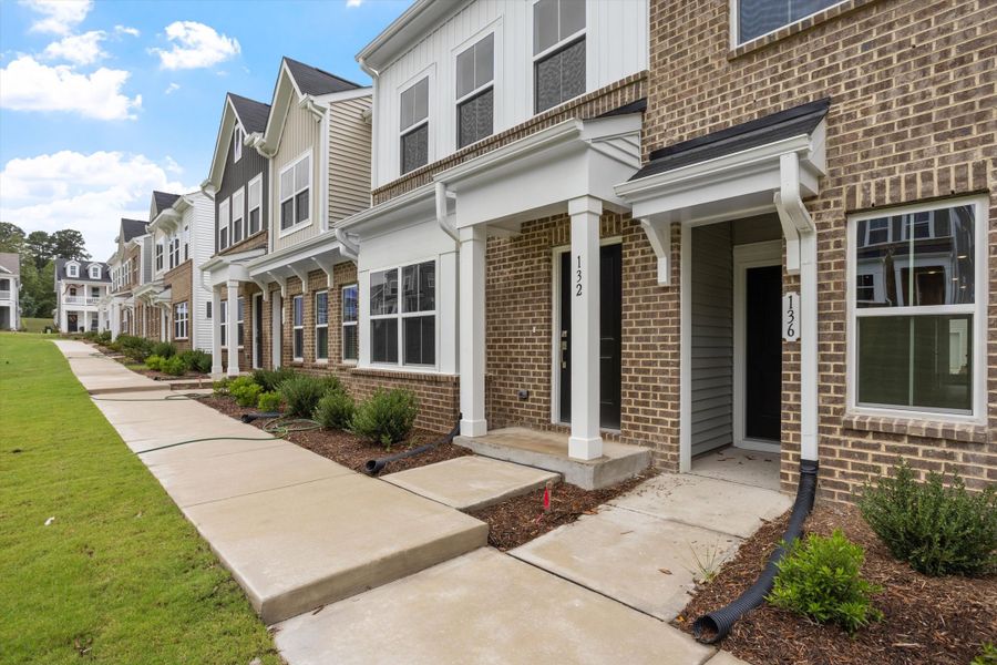 Exterior details and patio area of a home in Renaissance at White Oak, Garner (Image 3). Exterior details and patio area of a home in Renaissance at White Oak, Garner (Image 3).