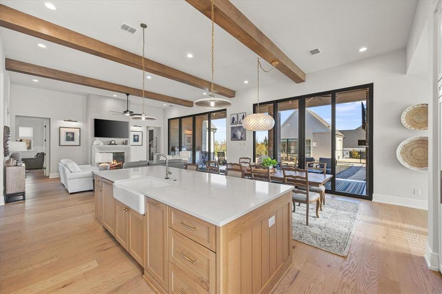 Open floor plan features kitchen opening onto family room and dining area