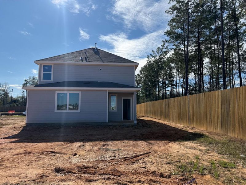 Exterior details and patio area of a home in River's Edge, Conroe (Image 3).