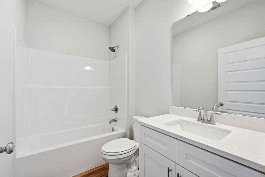 Furnished interior view inside a new home in Southern Charm, Crestview (Image 6).