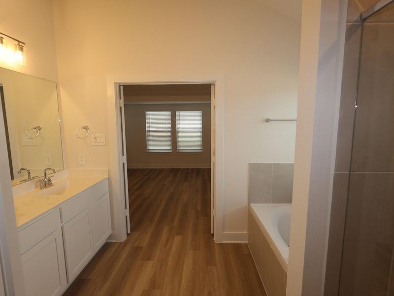 Furnished interior view inside a new home in Lone Star Landing, Montgomery (Image 6).