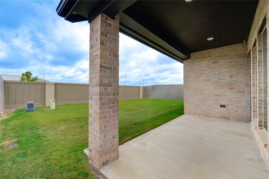 Exterior details and patio area of a home in Cross Creek West 45', Fulshear (Image 1). Exterior details and patio area of a home in Cross Creek West 45', Fulshear (Image 1).
