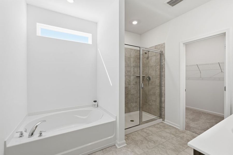 Representative furnished interior of a home built from the Norcross by Taylor Morrison in Windance Lake, Loganville (Image 30).