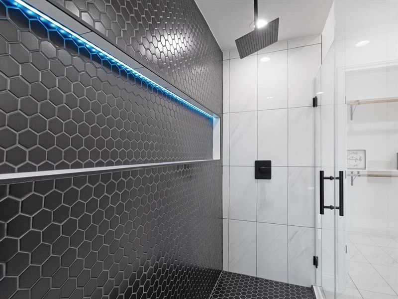 Bathroom featuring walk in shower