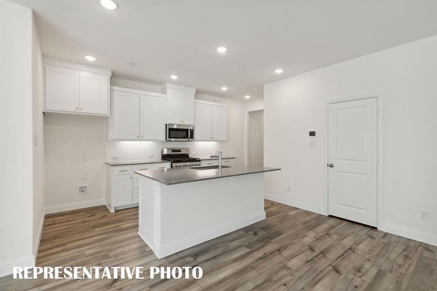 Gorgeous cabinetry paired with stylish finishes can be found in your new dream kitchen!  REPRESENTATIVE PHOTO