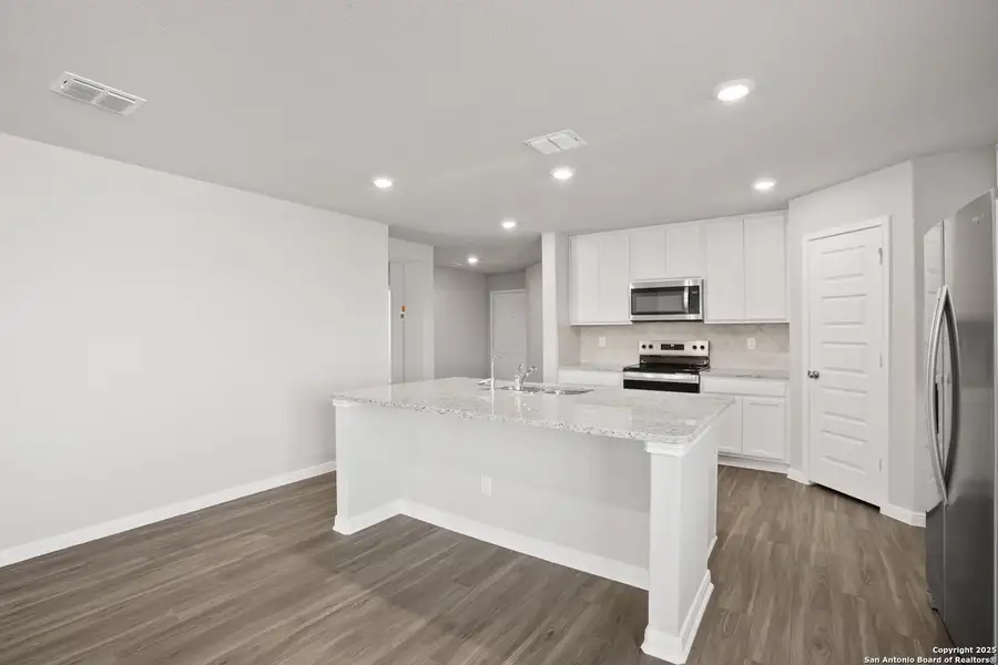 Furnished interior view inside a new home in Swenson Heights, Seguin (Image 11).