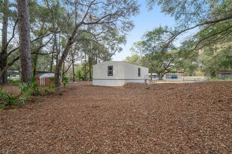 Exterior details and patio area of a home in , Summerfield (Image 21).