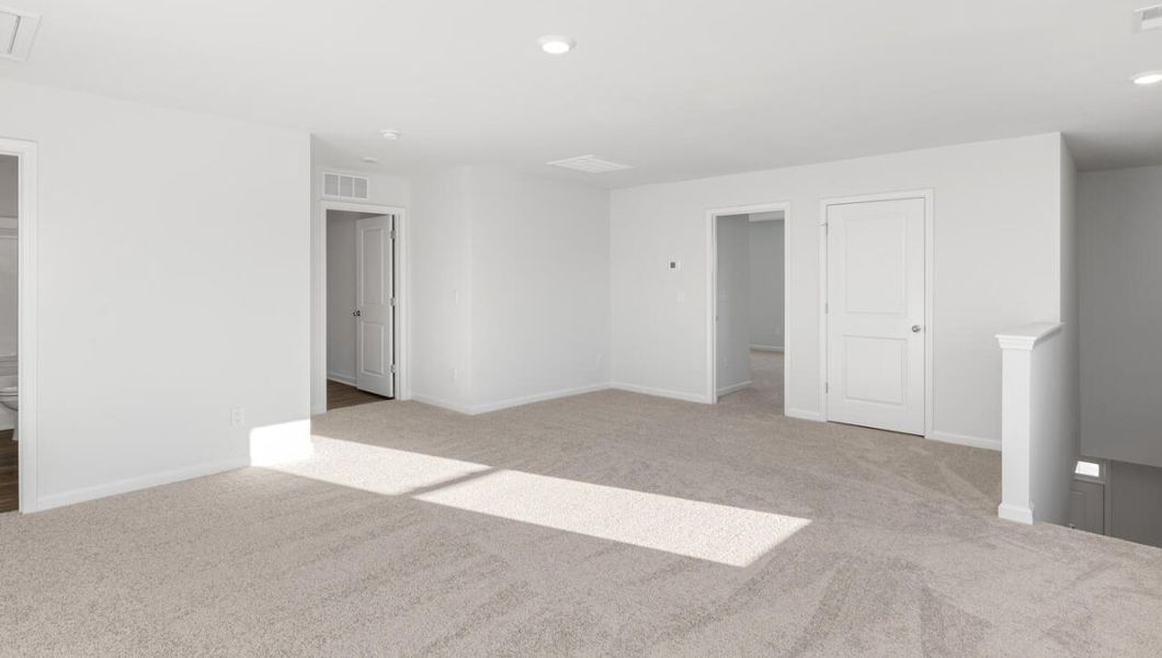 Spacious, unfurnished interior of a new home in The Pines at Blake Farm, Wilmington (Image 15).