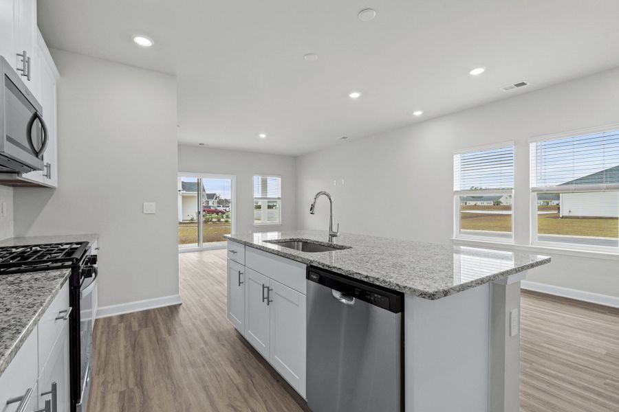 Furnished interior view inside a new home in Waterside - Boardwalk Series, Longs (Image 13). Furnished interior view inside a new home in Waterside - Boardwalk Series, Longs (Image 13).