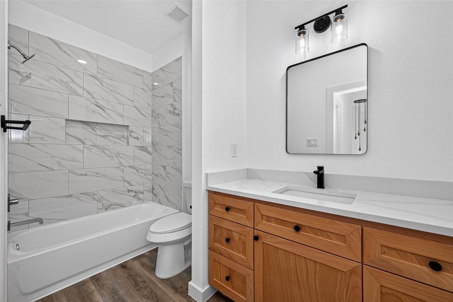 Furnished interior view inside a new home in , Conroe (Image 9).