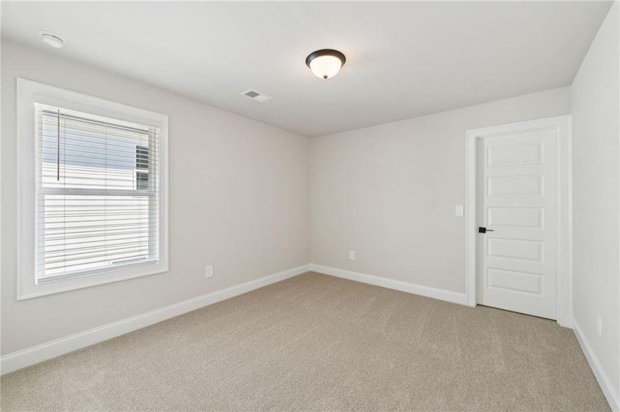 Spacious, unfurnished interior of a new home in Vines at Mill Creek - Estate Series, Braselton (Image 51).