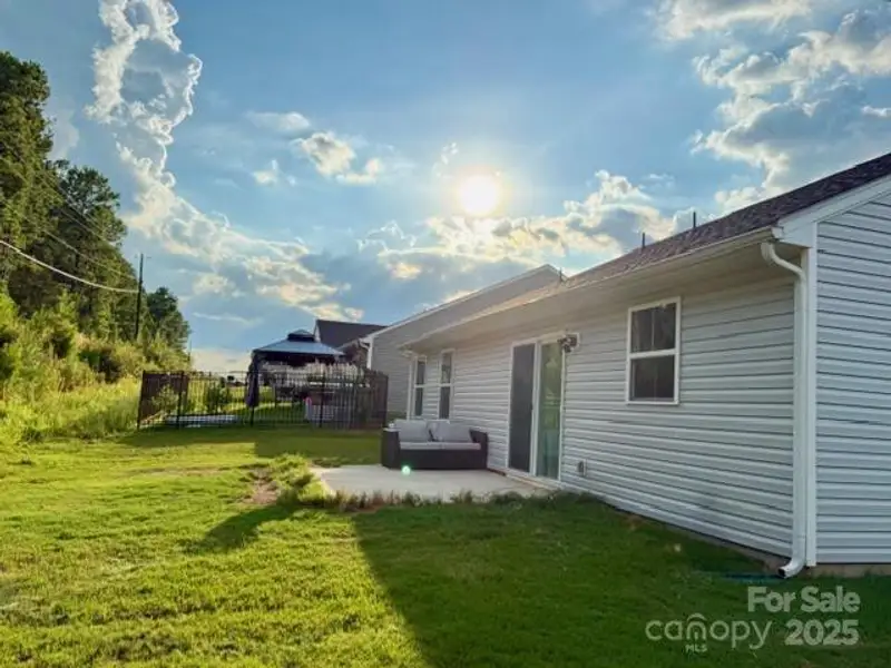 Exterior details and patio area of a home in Rosegate, Lancaster (Image 3).