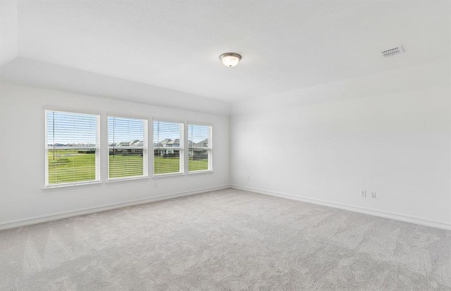 Spacious game room with large windows Spacious game room with large windows
