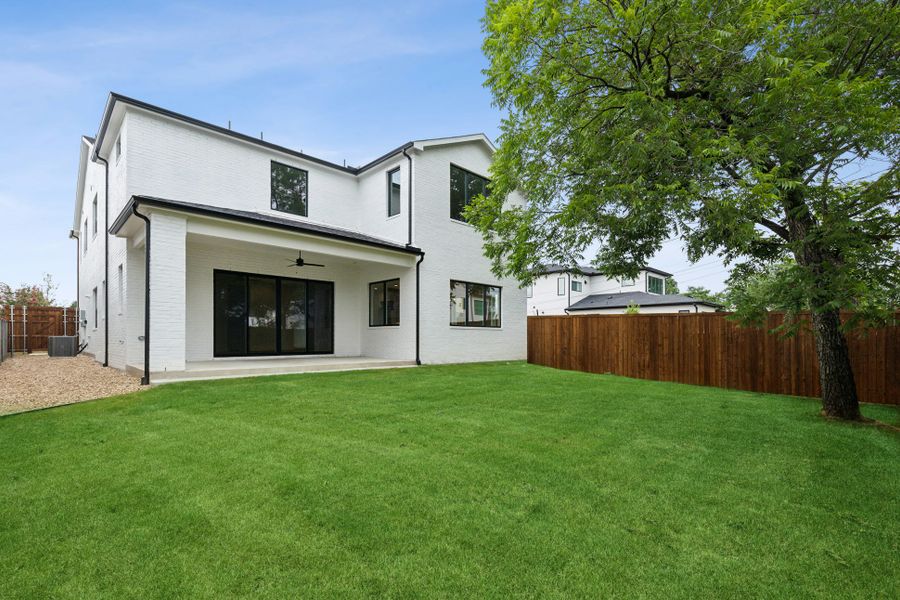 Front exterior of a new home in , Dallas, TX, highlighting curb appeal (Image 56).