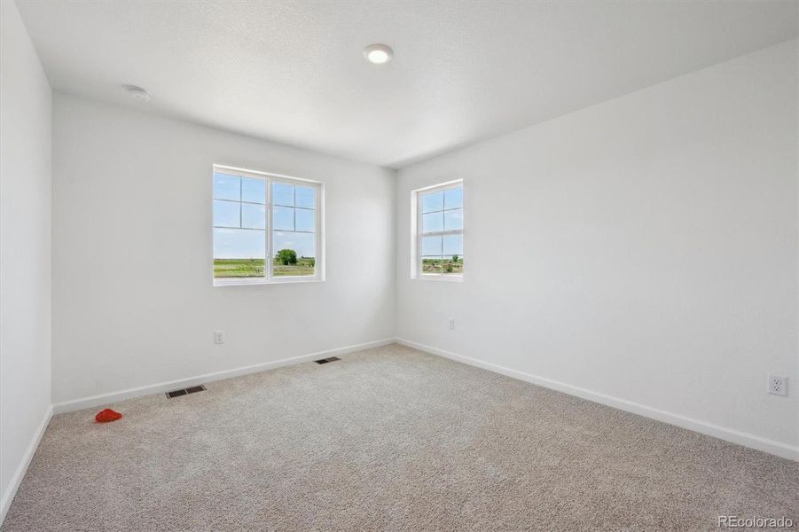 Spacious, unfurnished interior of a new home in Vista West, Keenesburg (Image 13).