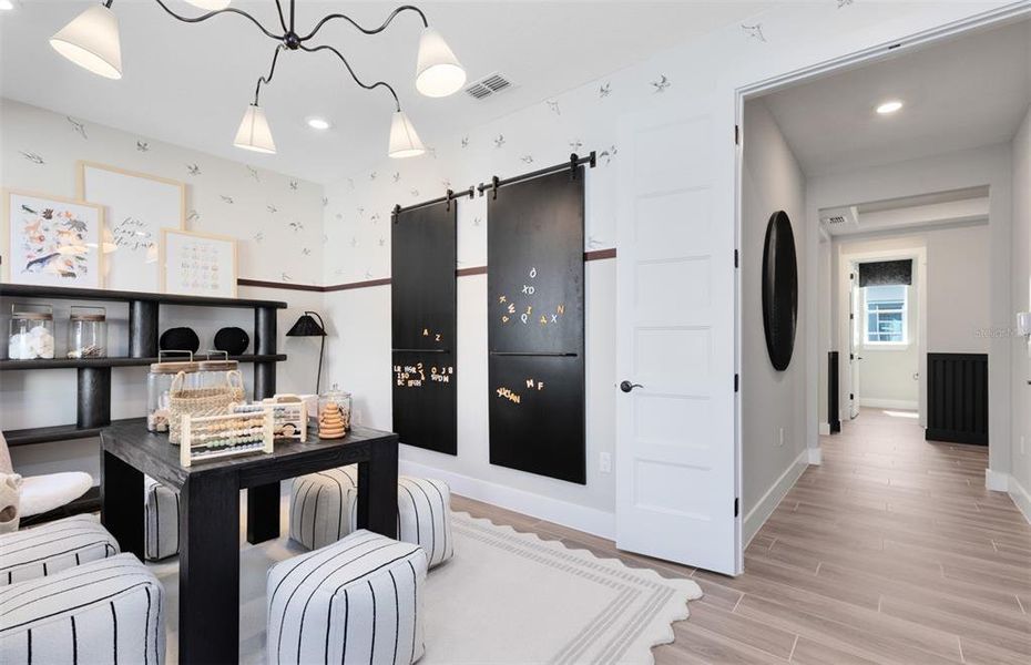 Furnished interior view inside a new home in Parkside Trails, Clermont (Image 9).